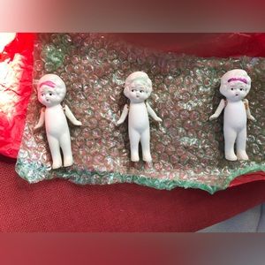 Three miniature bisque dolls